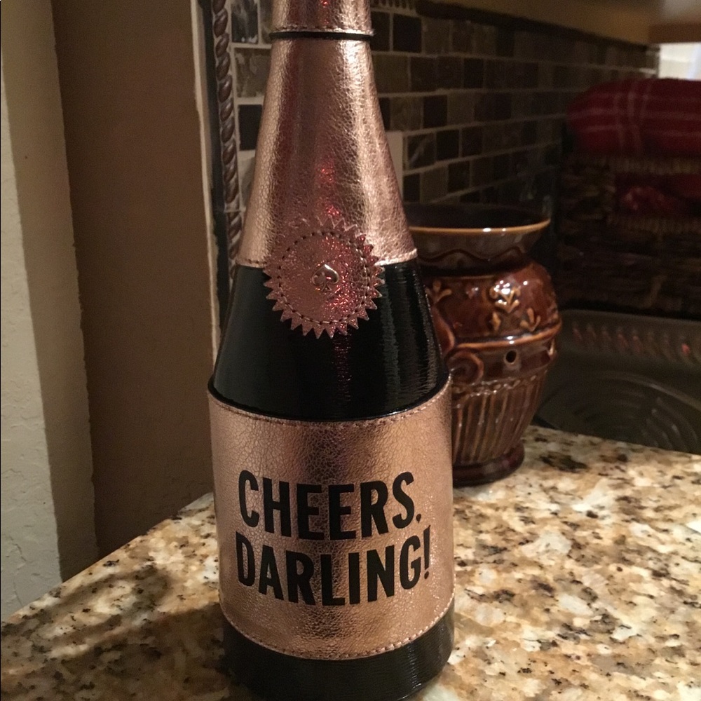 Kate spade champagne bottle clutch